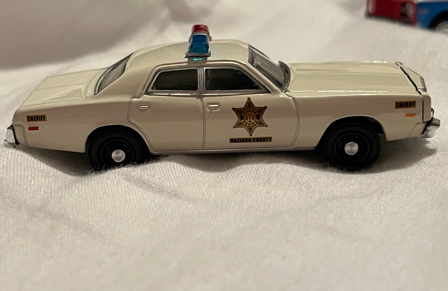 1:64 1977 Plymouth Fury - Hazzard County Sheriff (Hobby Exclusive) preorder july